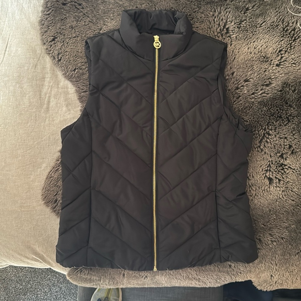 Brand New Womens Michael Kors down vest, black, large.